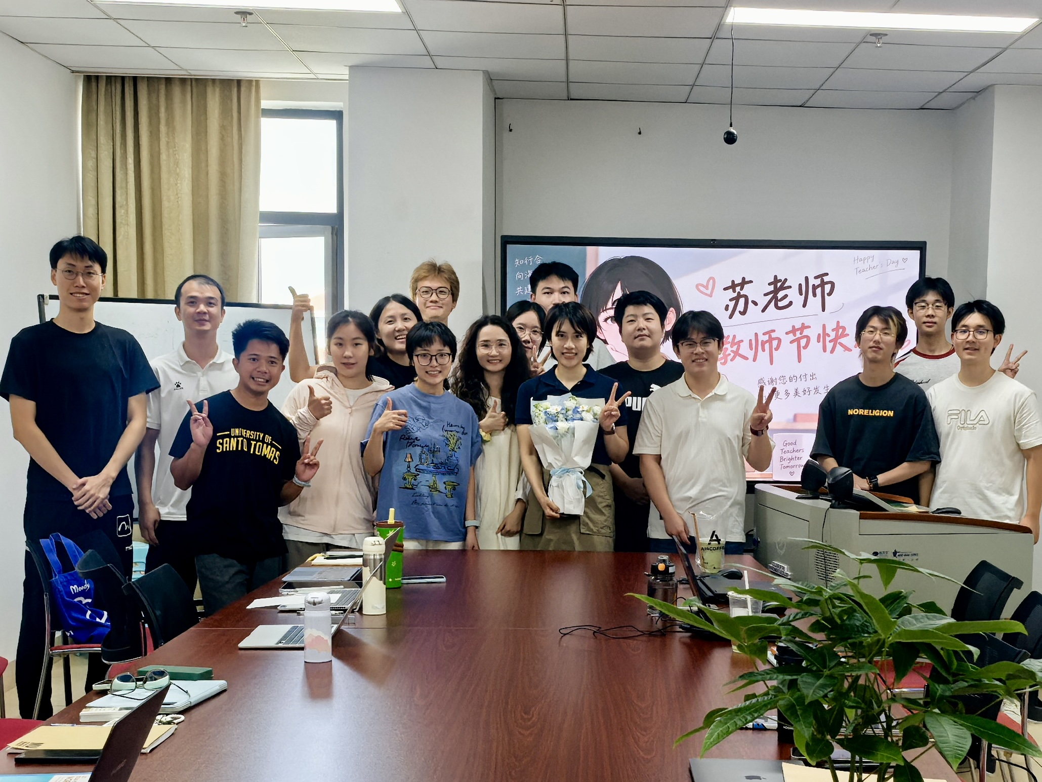 The SESuS Lab team gathered in a meeting room